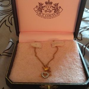Juicy couture gold peace necklace